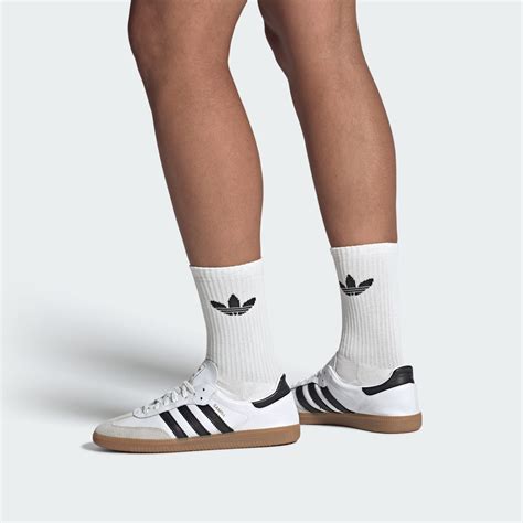 white adidas samba on feet